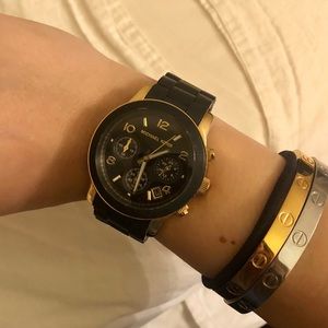 Michael Kors two toned black and gold watch